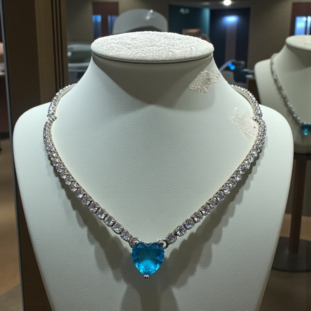 Elegant Silver Necklace with Blue Heart Pendant